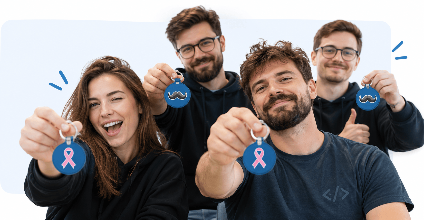 Pracownicy Edge One Solutions z brelokami kampanii profilaktycznej